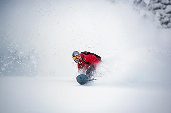 Snowboard gear (snowboarding in deep powder)